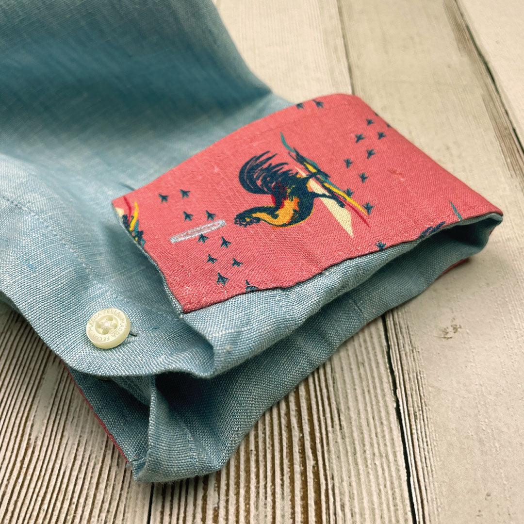 Caribbean Blue/Rooster Print ++ mens light blue linen shirt with rooster accent cuffs