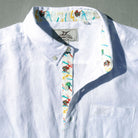 Sail White/Hurricane Print ++ white long sleeve linen shirt with 80s inspired accents